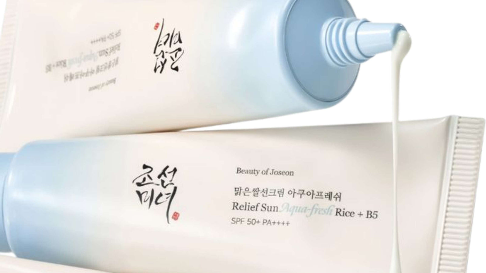 En tub och förpackning av Beauty of Joseon Relief Sun: Rice + Probiotics SPF50+ PA++++ solskyddskräm på en ljus bakgrund.
