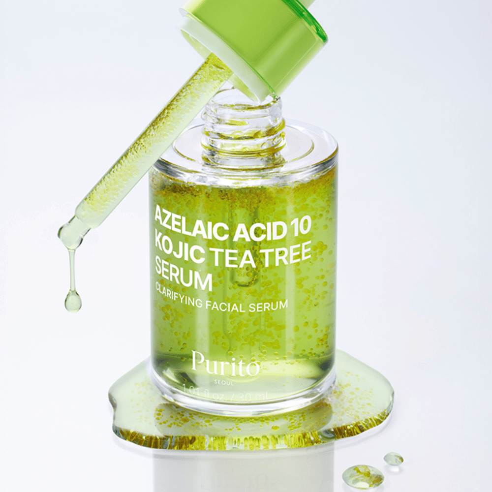 Lähikuva Purito Azelaic Acid 10 Kojic Tea Tree Serum pipetillä ja tippoja. Antaa kirkkaamman ihon ja vähentää epäpuhtauksia.