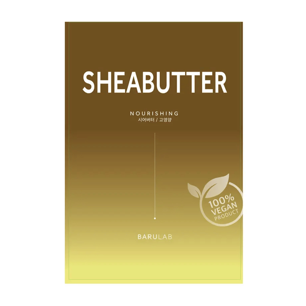 Pakkaus BARULAB "SHEABUTTER Nourishing" -maskista, merkitty "100% Vegan Product". Pakkauksessa on värigradientti, joka muuttuu tumman kultaisesta ylhäältä vaaleankeltaiseen alhaalla.