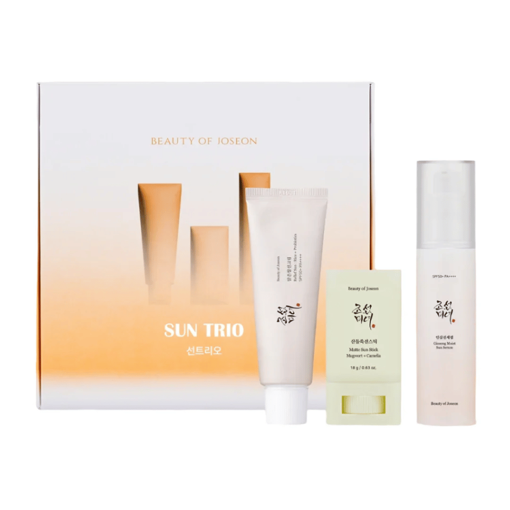 Beauty of Joseon - Sun Trio lahjapakkaus, joka sisältää kolme aurinkosuojatuotetta: Relief Sun Rice + Probiotics, Matte Sun Stick Mugwort + Camellia ja Ginseng Moist Sun Serum valko-oranssissa liukuväripakkauksessa.