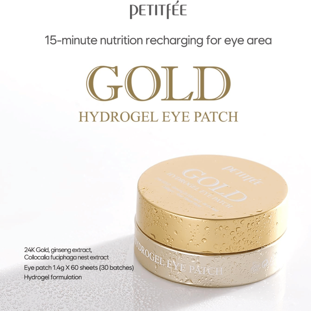 Tyylikäs tuotekuva tuotteesta PETITFEE Gold Hydrogel Eye Patch, jossa on kullanvärinen pakkaus vaaleaa taustaa vasten. Teksti korostaa ainesosia kuten 24K kultaa, ginsengiä ja hydrogeelikoostumusta kosteutukseen ja hehkuun.