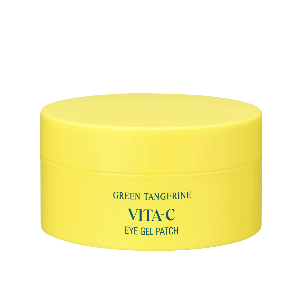 Keltainen purkki, jonka merkintä on "GREEN TANGERINE VITA-C EYE GEL PATCH", luultavasti silmänympärysnaamioita, jotka sisältävät C-vitamiinia.