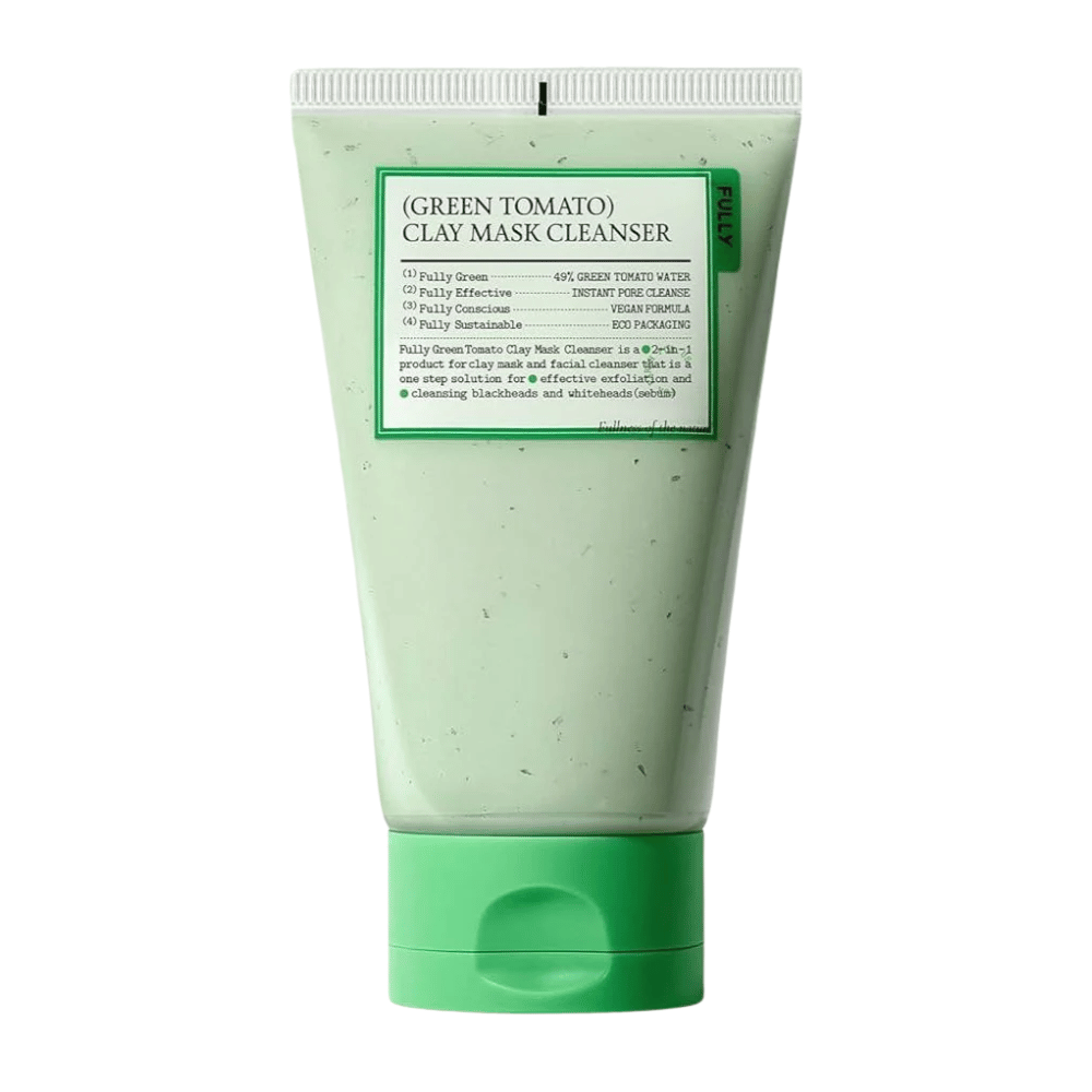 Tuotekuva tuotteesta Green Tomato Clay Mask Cleanser vihreässä tuubissa valkoista taustaa vasten. Painopiste on pakkauksessa ja muotoilussa.