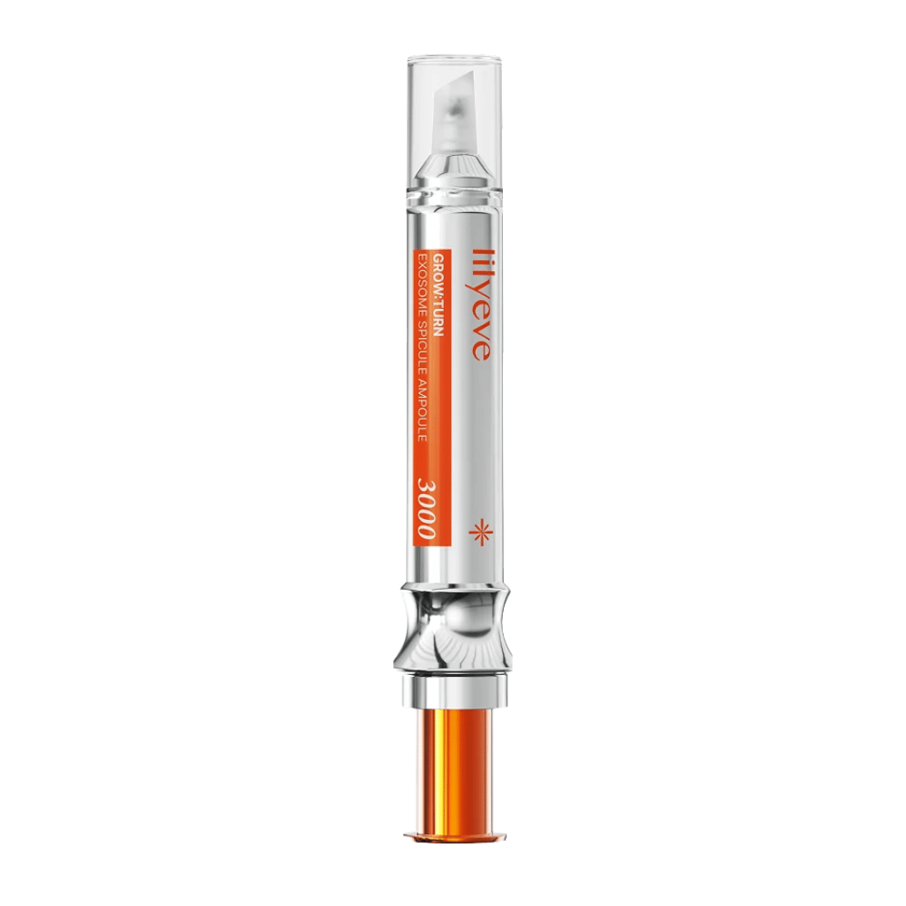 LILYEVE Grow Turn Exosome Spicule Ampoule 3000 – hiuspohja-ampulli tarkkuusapplikaattorilla hopean- ja oranssinvärisessä pakkauksessa.