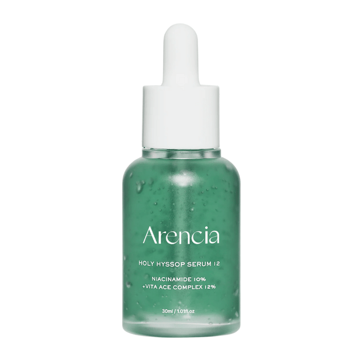 Arencia Holy Hyssop Serum 12 vihreässä lasipullossa pipetillä, kasvoseerumi, jossa on 10 % niacinamidia ja 12 % ACE-vitamiinikompleksia.