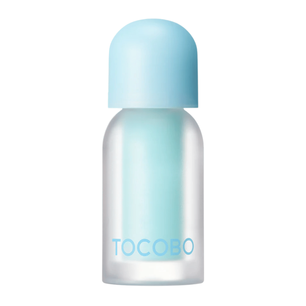 Produktbild av TOCOBO Juicy Berry Plumping Lip Oil i frostad glasflaska med blå kork. Återfuktande och glansgivande läppolja.