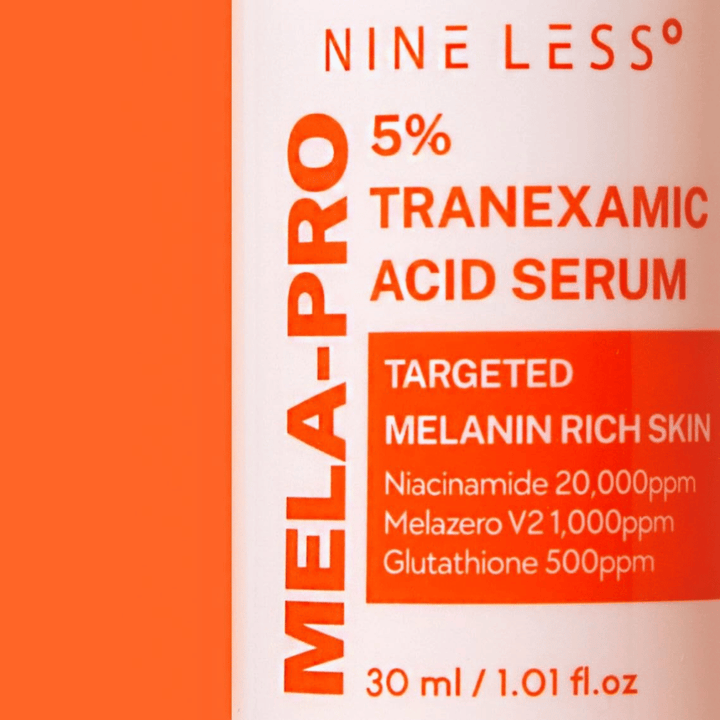 Lähikuva NINE LESS MELA-PRO 5% Tranexamic Acid Serum 5 % traneksaamihapolla, niasiiniamidilla ja glutationilla.