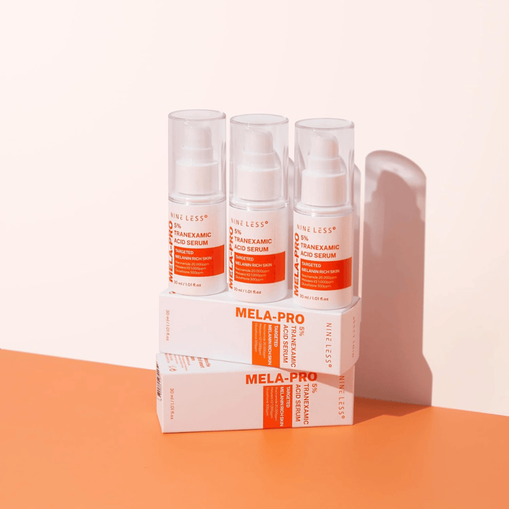 Kolme NINE LESS MELA-PRO 5% Tranexamic Acid Serum 30 ml, kirkastava seerumi niasiiniamidilla ja glutationilla melaniinirikkaalle iholle.
