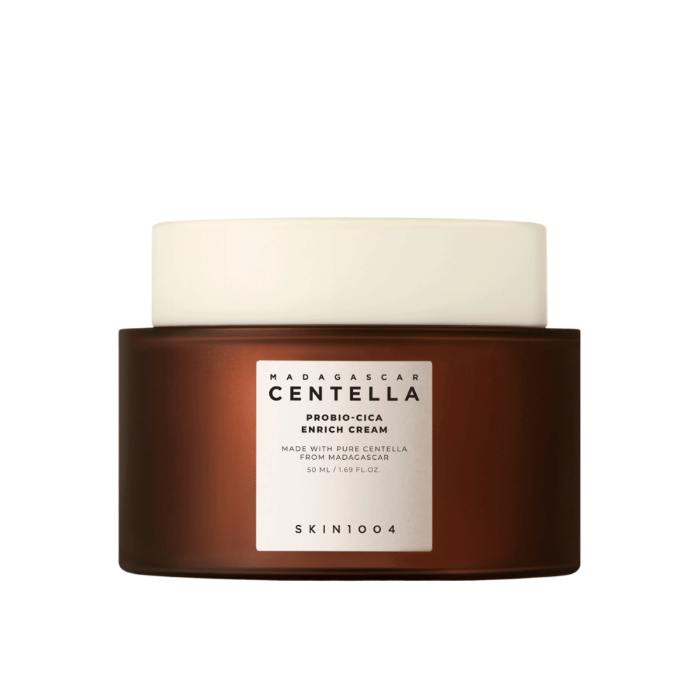 Ruskea purkki Madagascar Centella Probio-Cica Enrich Cream neutraalia taustaa vasten.