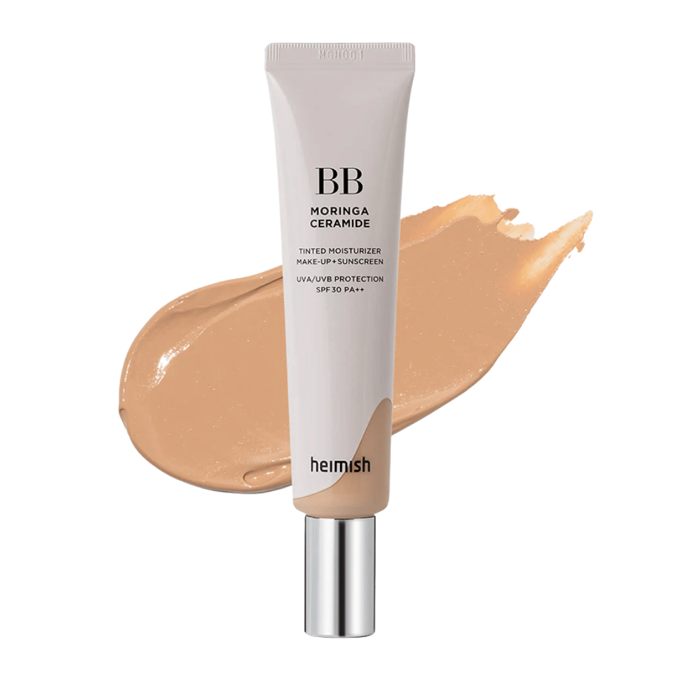 Tuotekuva tuotteesta Heimish Moringa Ceramide BB Cream beigeen BB-voidevedon edessä. Kuva korostaa keskitasoisen tummaa sävyä sekä tuotteen kosteuttavia ja tasoittavia ominaisuuksia.