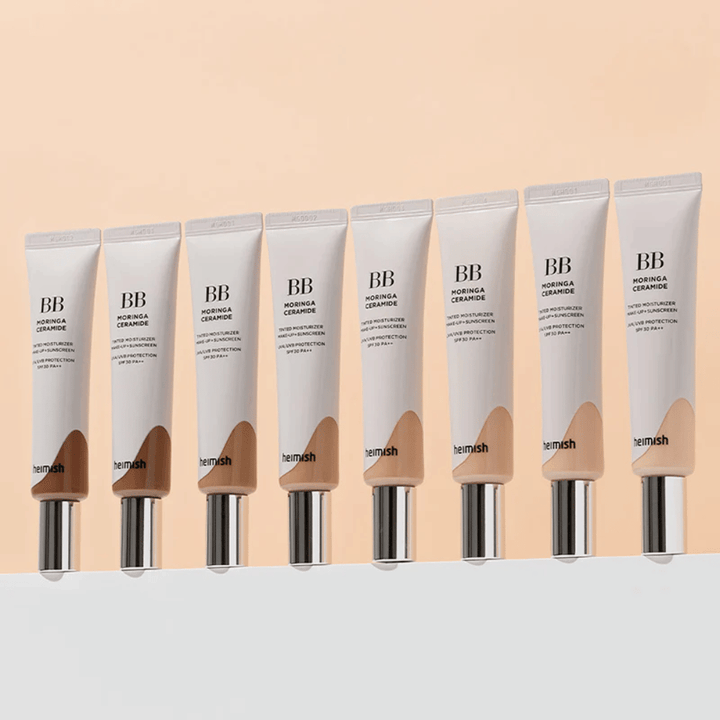 Rivi tuotteita Heimish Moringa Ceramide BB Cream useissa värisävyissä. Kuva havainnollistaa vaihtelua vaaleammista tummempiin sävyihin, jotta ne sopivat eri ihonsävyihin ja tarpeisiin.