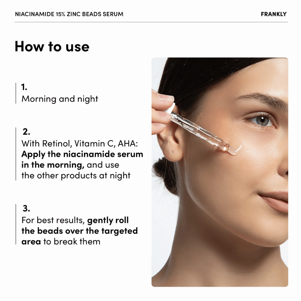 Nainen levittää FRANKLY Niacinamide 15% + Zinc Beads Serumia pipetillä poskelle. Teksti selittää käytön aamulla ja illalla sekä helmien varovaisen hieronnan.