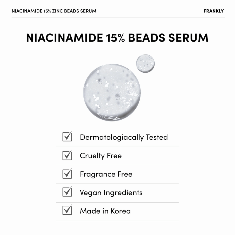 Kirkas geeli, jossa on valkoisia helmiä FRANKLY Niacinamide 15% + Zinc Beads Serumissa. Teksti osoittaa, että tuote on vegaaninen, hajusteeton ja dermatologisesti testattu.