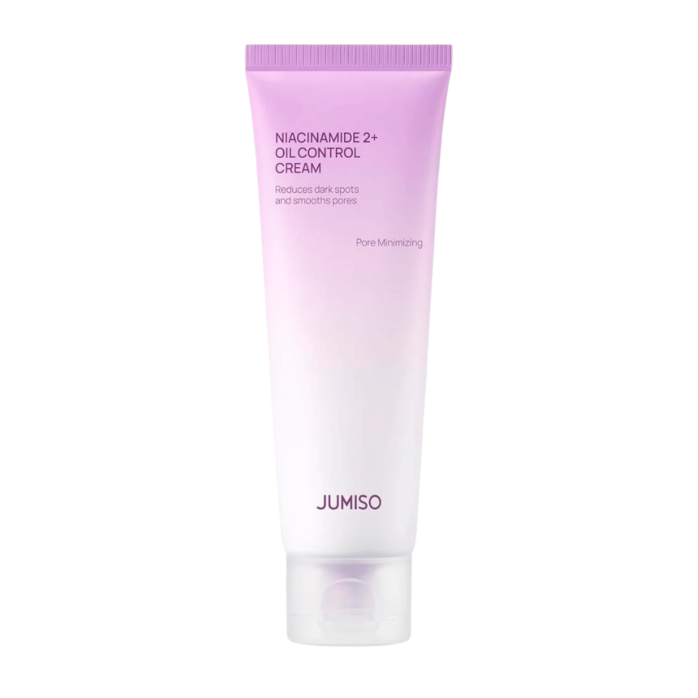 Tuotekuva tuotteesta JUMISO Niacinamide 2+ Oil Control Cream vaaleaa taustaa vasten. Vaaleanpunainen ja valkoinen tuubi korostaa tuotteen keskittymistä talinerityksen hallintaan, ihohuokosten pienentämiseen ja ihonsävyn parantamiseen rasvaiselle ja sekaiholle.