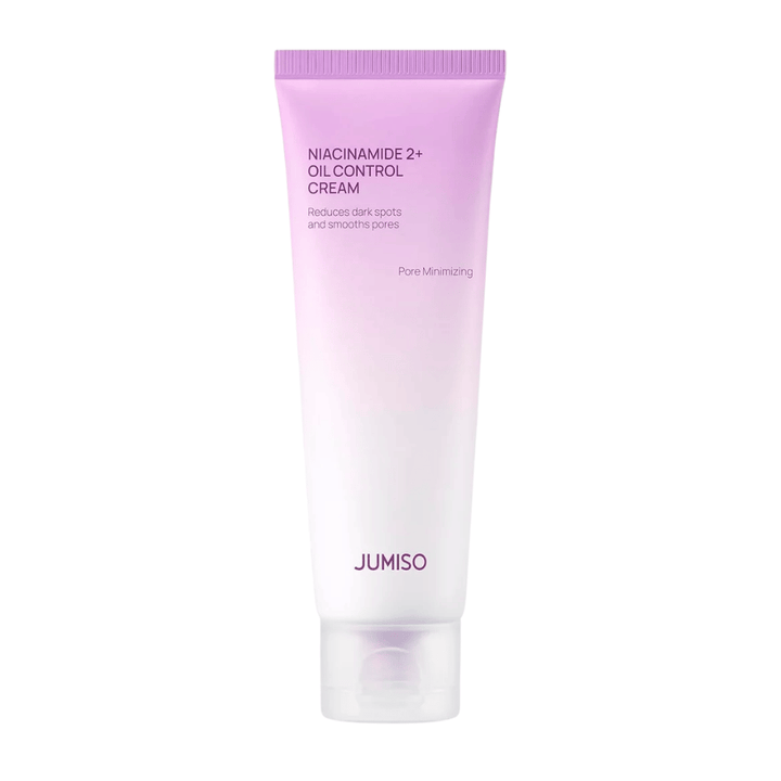 Tuotekuva tuotteesta JUMISO Niacinamide 2+ Oil Control Cream vaaleaa taustaa vasten. Vaaleanpunainen ja valkoinen tuubi korostaa tuotteen keskittymistä talinerityksen hallintaan, ihohuokosten pienentämiseen ja ihonsävyn parantamiseen rasvaiselle ja sekaiholle.