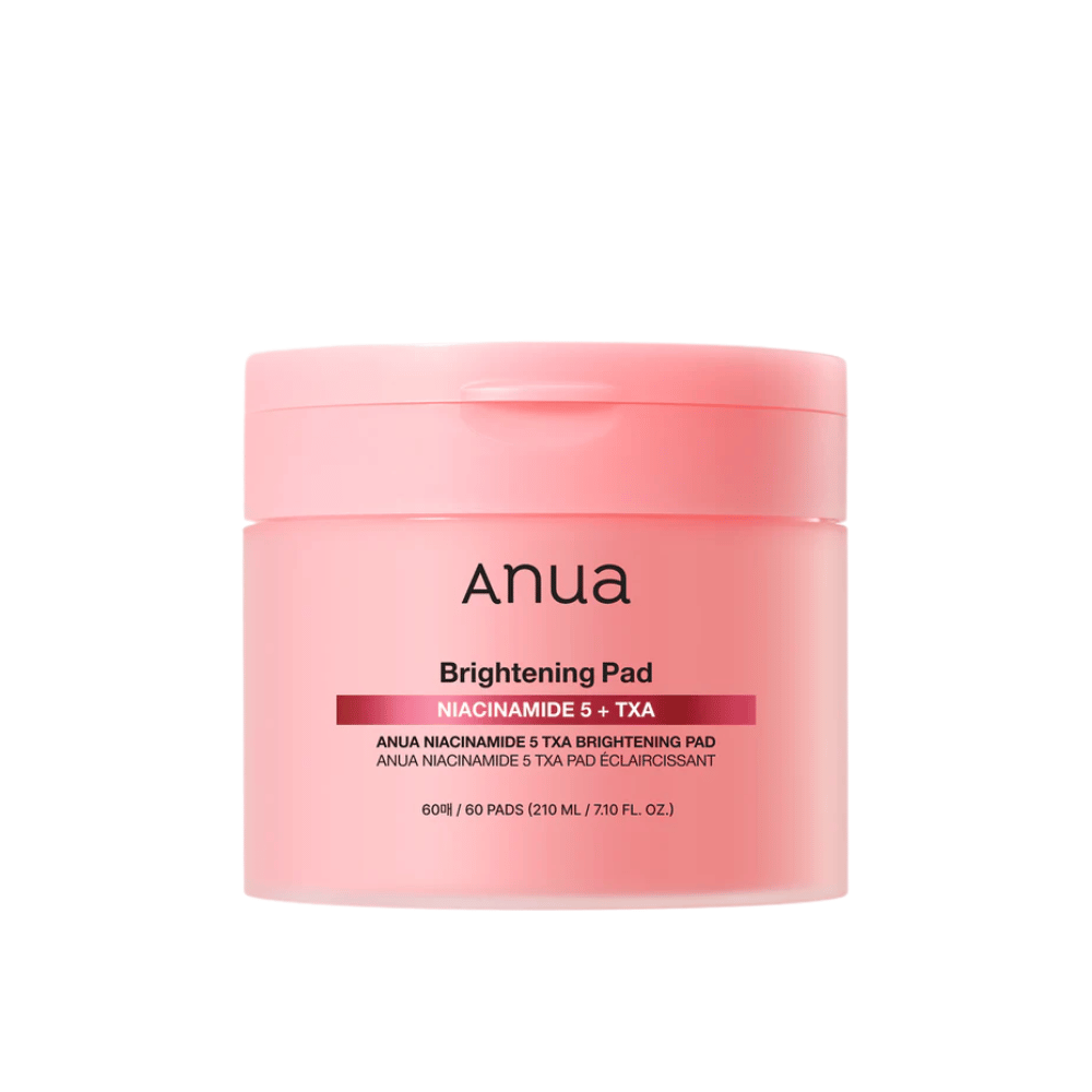 Vaaleanpunainen pakkaus Anua Brightening Pad -tuotteesta, jossa teksti "Niacinamide 5 + TXA", sisältää 60 ihoa kirkastavaa ja tasoittavaa hoitotyynyä.