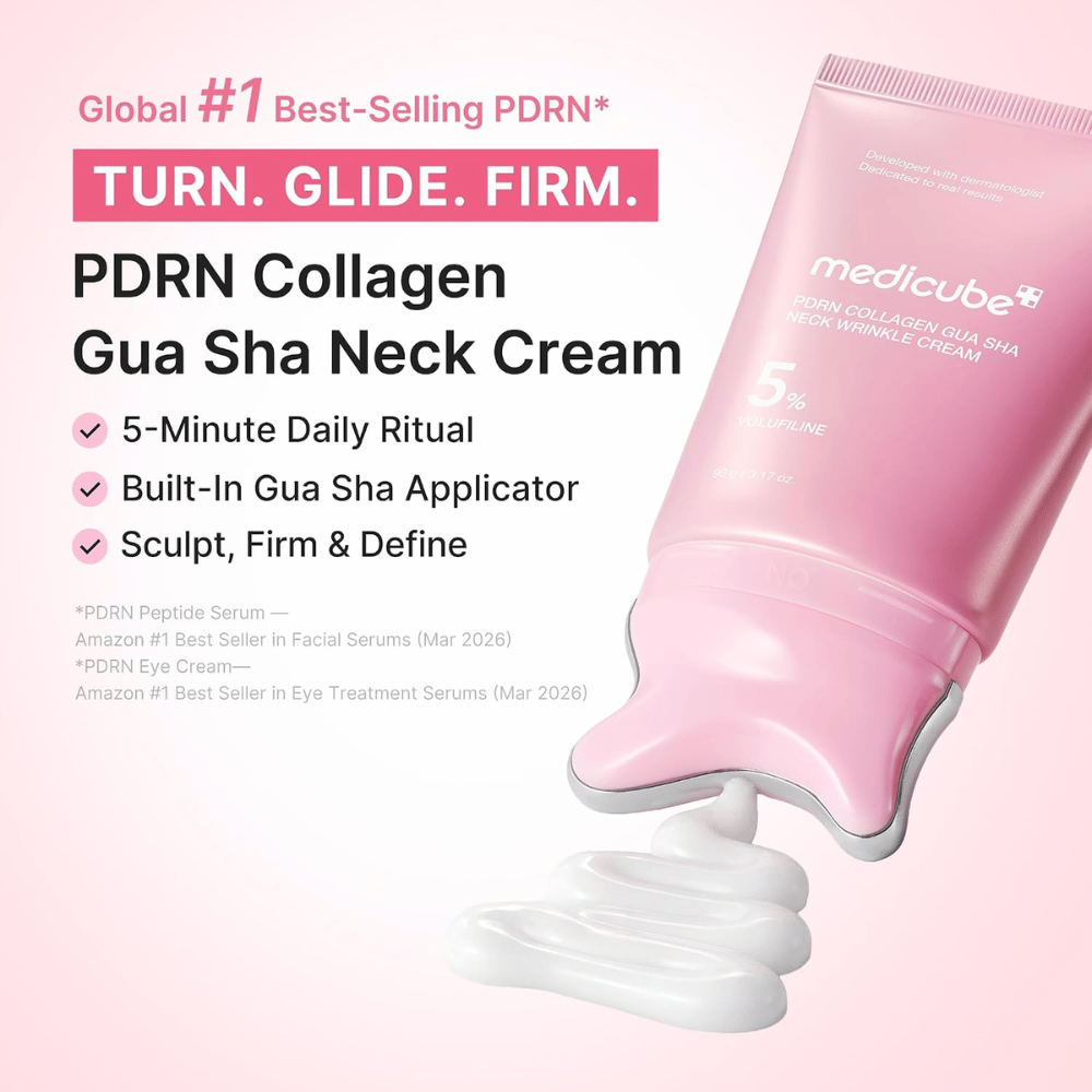 5. Medicube PDRN Collagen Gua Sha Neck Wrinkle Cream – vaaleanpunainen kaulavoide gua sha -applikaattorilla ja kermaisella koostumuksella