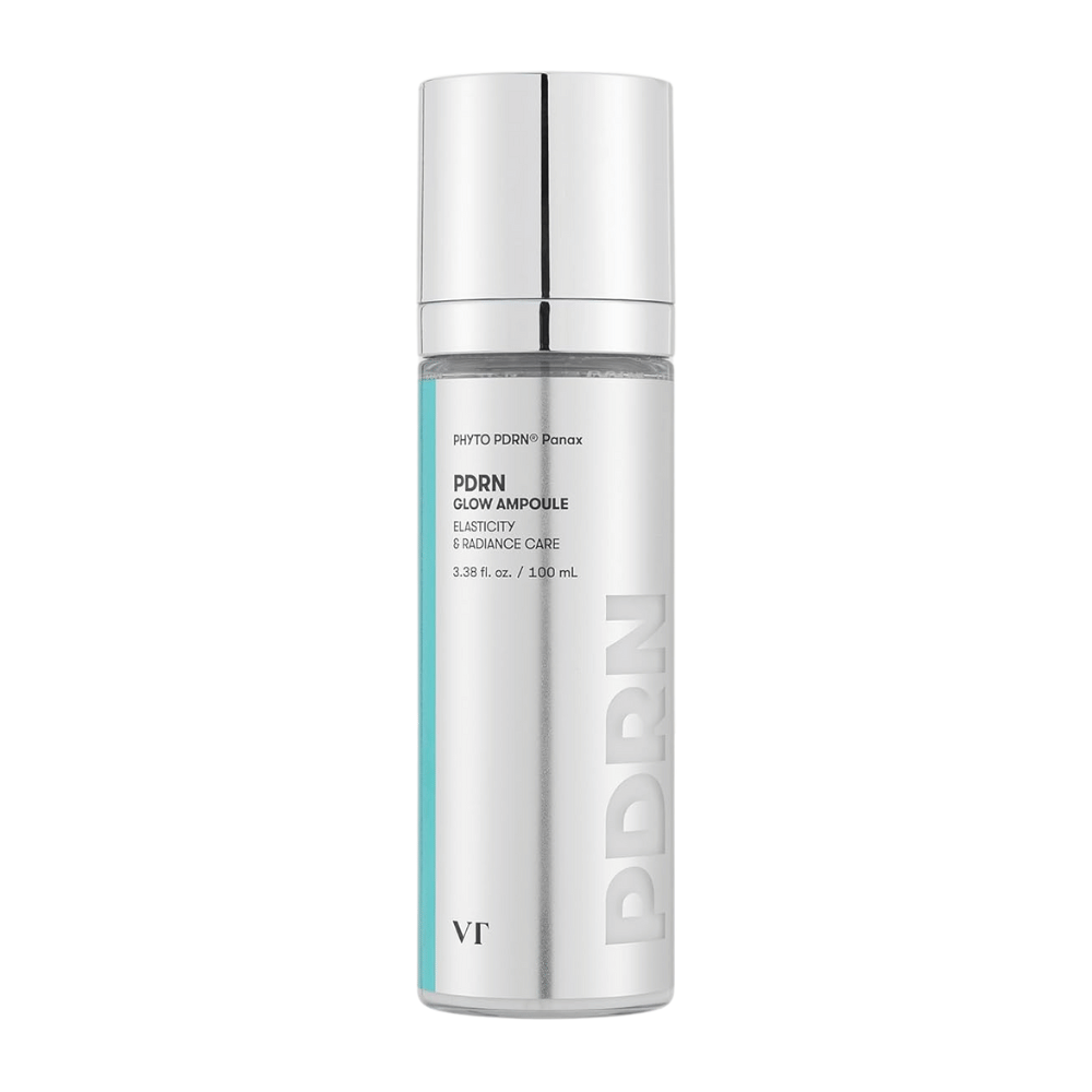 VT PDRN Glow Ampoule hopeanvärisessä pullossa, jossa on pumppu, merkintä, joka osoittaa 100 ml sisällön. Tuote on suunniteltu joustavuuteen ja säteilevälle iholle, tekstillä "PHYTO PDRN® Panax" ja "Elasticity & Radiance Care".
