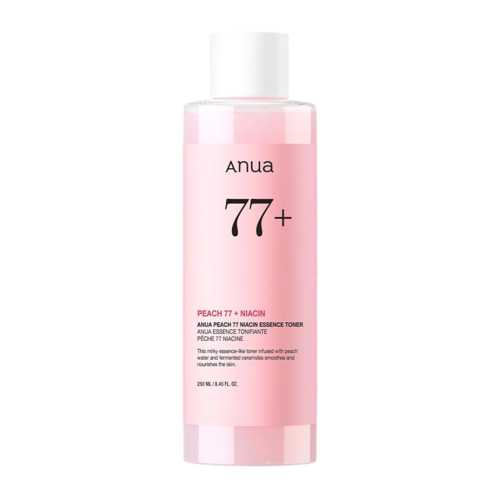 Anua Peach 77 Niacin Essence Toner läpinäkyvässä vaaleanpunaisessa pullossa, jossa on valkoinen korkki, sisältäen 250 ml maitomaista kasvovettä tasaisemman ihonsävyn ja hehkun saamiseksi.