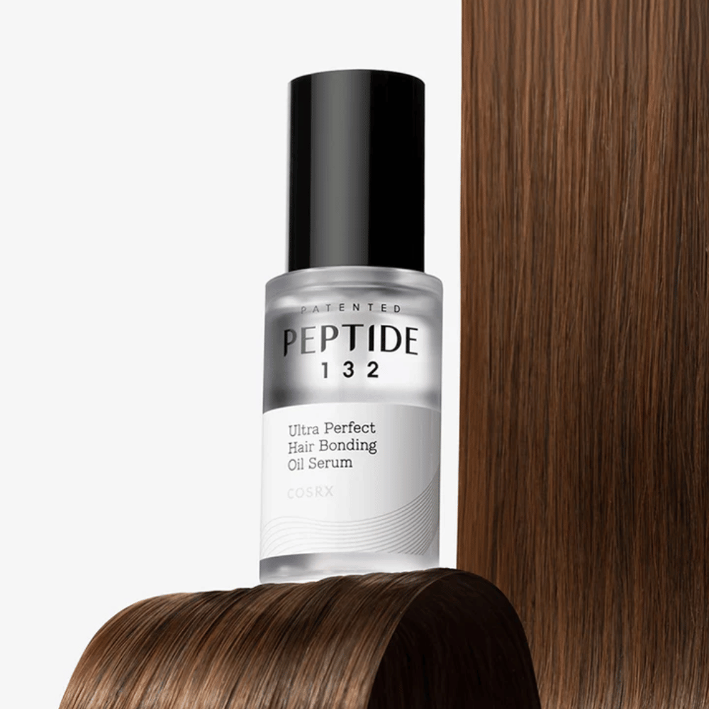 COSRX Peptide 132 Ultra Perfect Hair Bonding Oil Serum sijoitettu kiiltävien hiusten joukkoon – antaa voimaa, pehmeyttä ja kiiltoa.