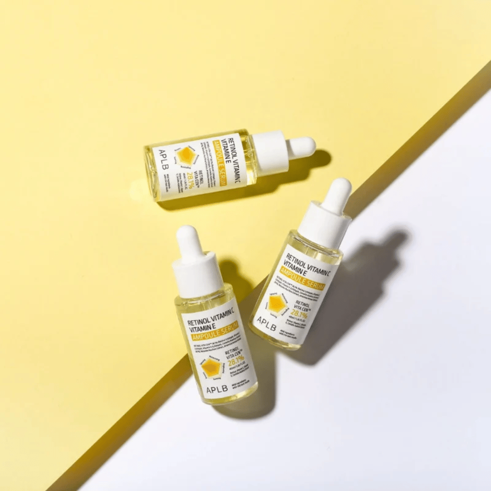 APLB Retinol Vitamin C Vitamin E Ampoule Serum keltaista ja valkoista taustaa vasten