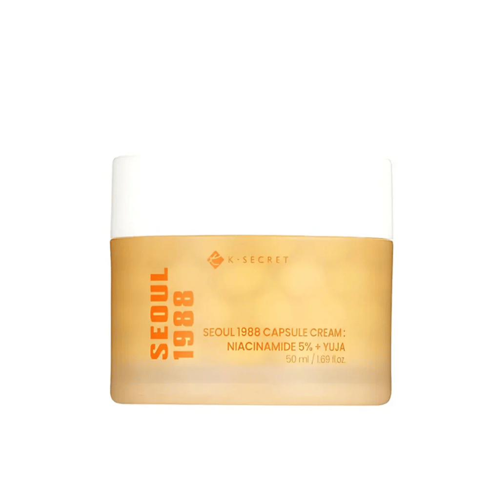 Purkki K-Secret Seoul 1988 Capsule Cream Niacinamide 5% + Yuja, 50 ml, kultaisessa suunnitellussa pakkauksessa.