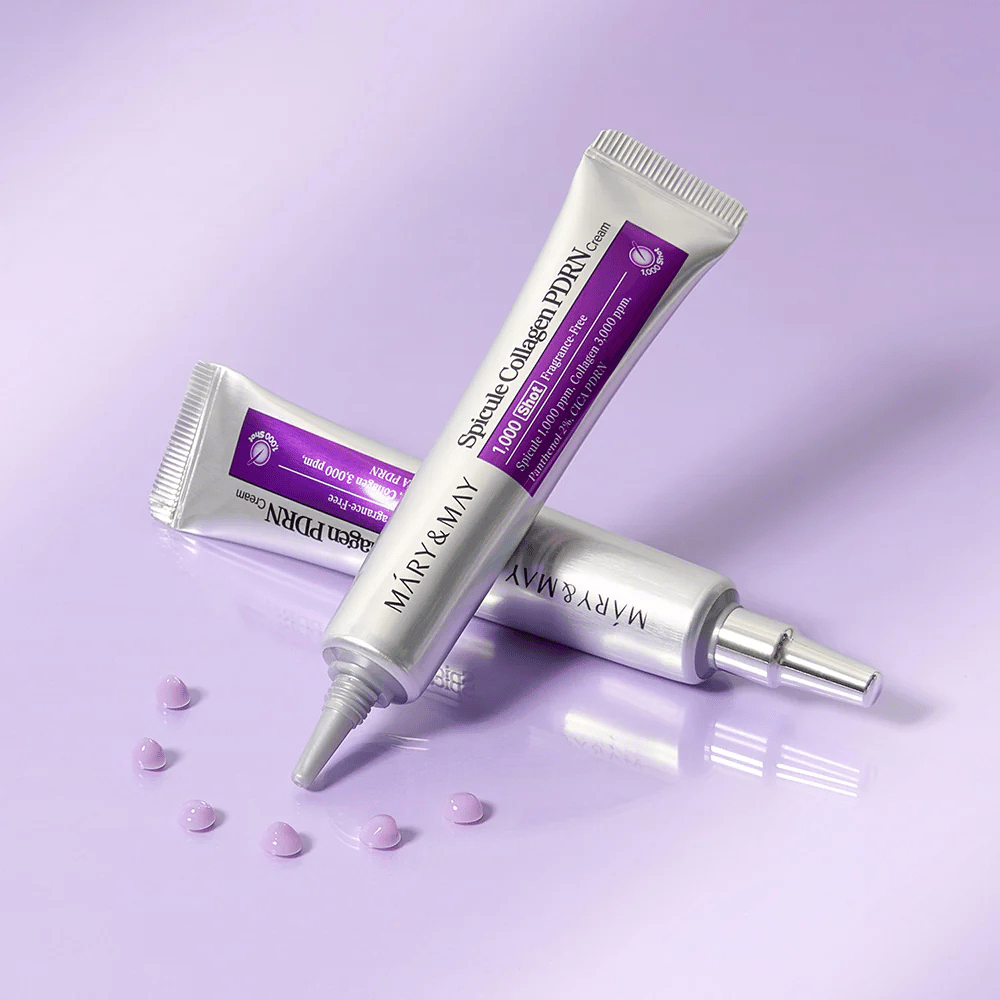 Mary & May Spicule Collagen PDRN Cream useissa tuubeissa violetilla taustalla, intensiivisesti uudistava kasvovoide spikule-teknologialla ja kollageenilla.