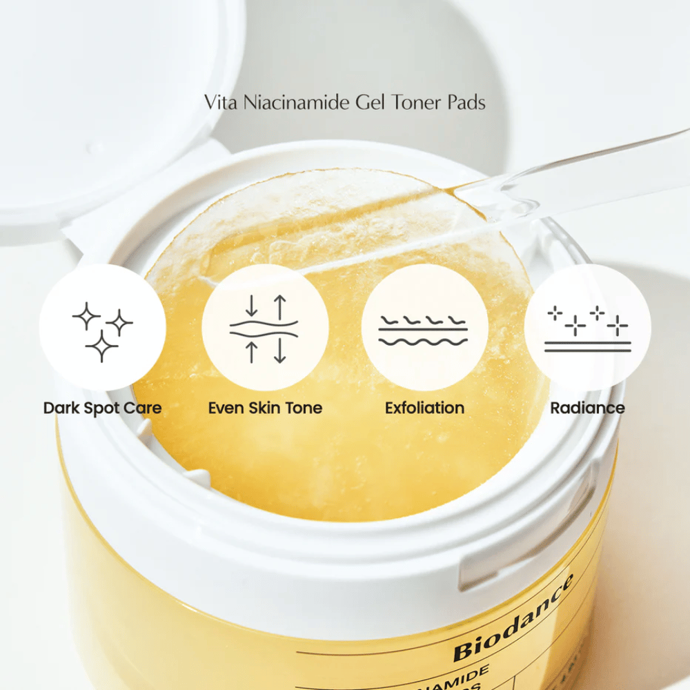 Biodance Vita Niacinamide Gel Toner Pads – kuorintatyynyt tasaisemman ihonsävyn, heleyden ja tummien läiskien hoitoon, esitettynä avoimessa purkissa pinsettien kanssa.