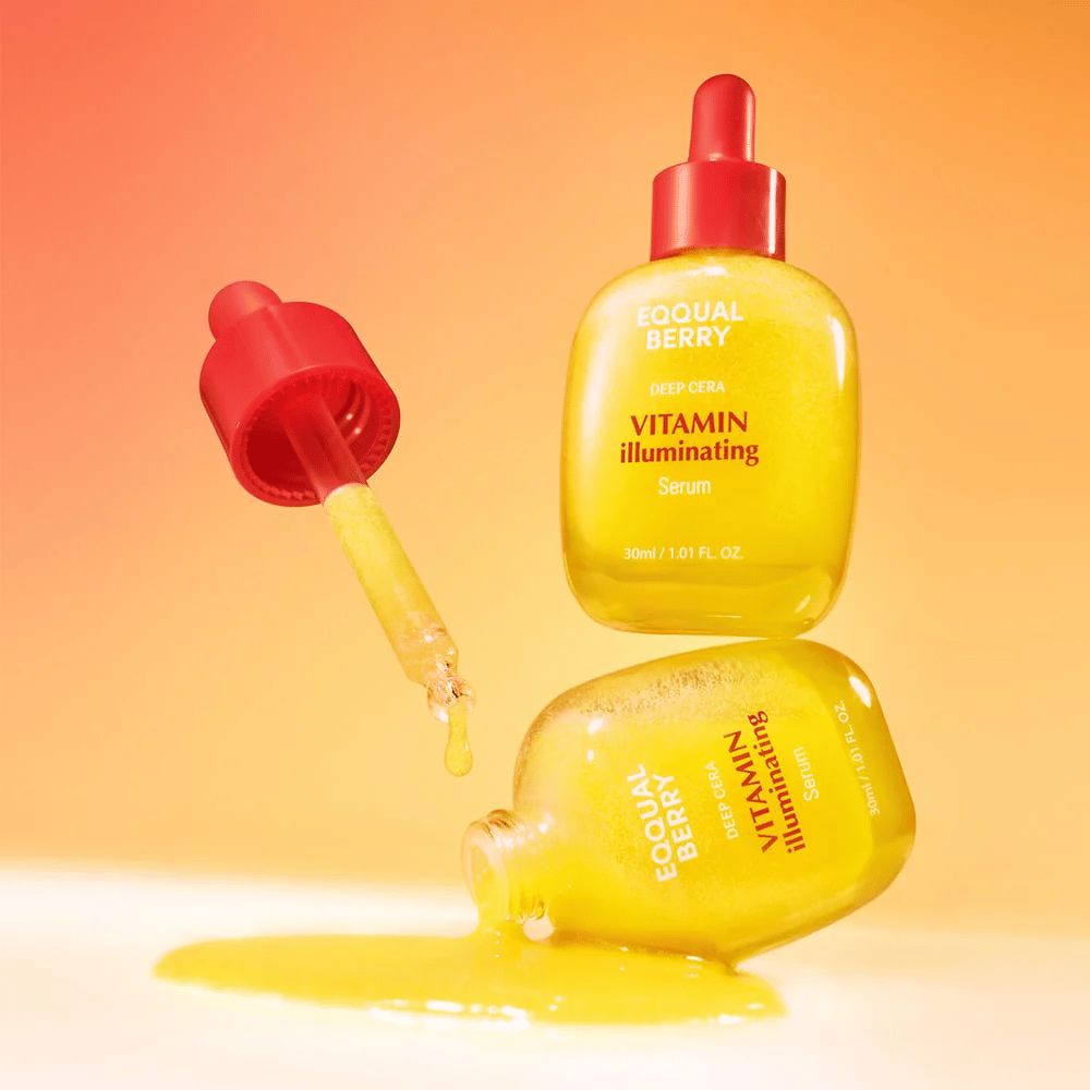 Equal Berry Vitamin Illuminating Serum kirkkaassa keltaisessa pullossa, jossa on punainen pipetti. Nestemäinen koostumus ja energinen tausta luovat eloisan ja raikkaan tunteen.
