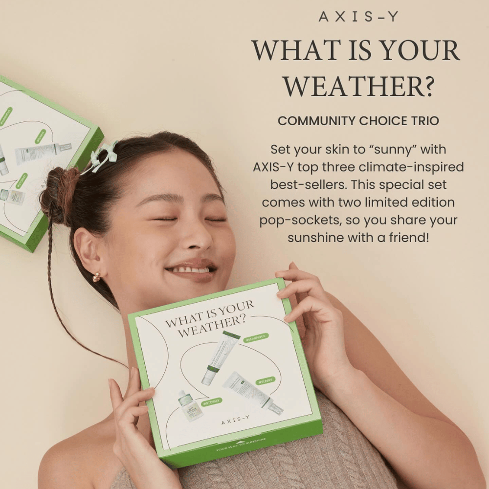Nainen esittelee AXIS-Y Ihonhoitosetti "What is your weather?" joka sisältää kolme ilmasto-inspiroitua huipputuotetta ja kaksi rajoitettua erää pop-socketteja jaettavaksi ystävän kanssa.