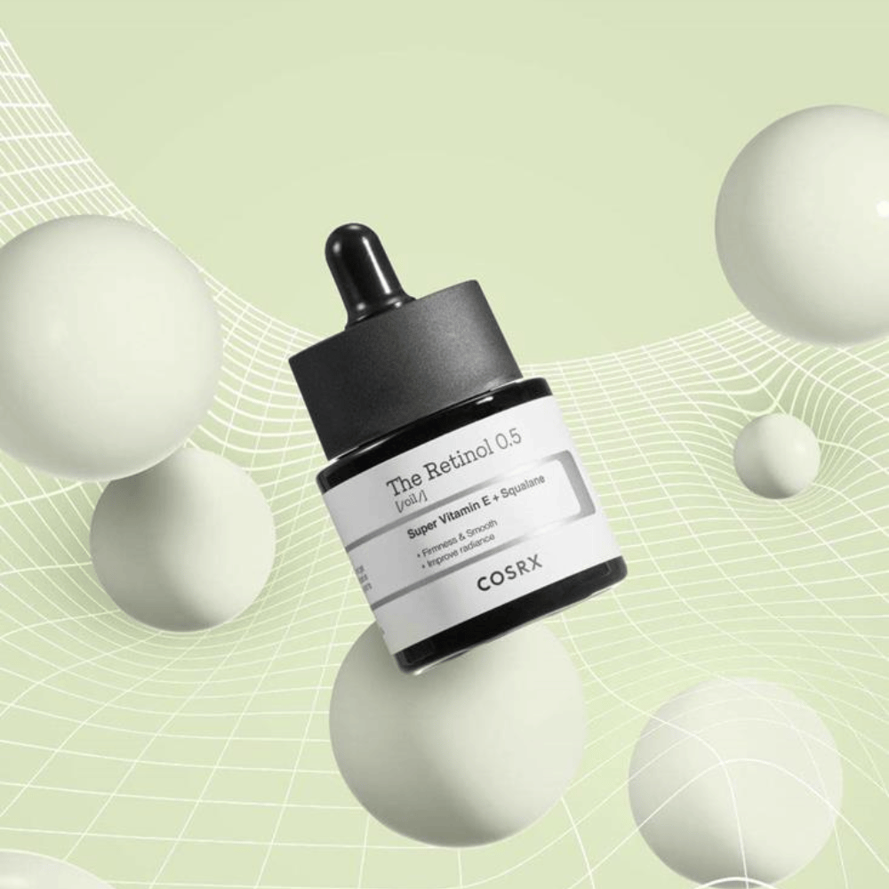 Pullo COSRX Retinoli 0.5 Öljy 20ml, joka edistää ikääntymistä estäviä etuja valkoisella taustalla.