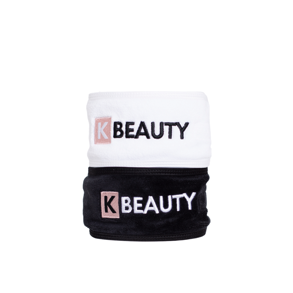 Kaksi mustavalkoista K-Beauty meikkipantaa, joissa on sana kauneus.